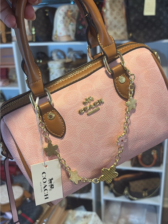 Coach Handbags - Coach Pink Leather Satchel with Tan Trim and Gold Chain Floral Charm